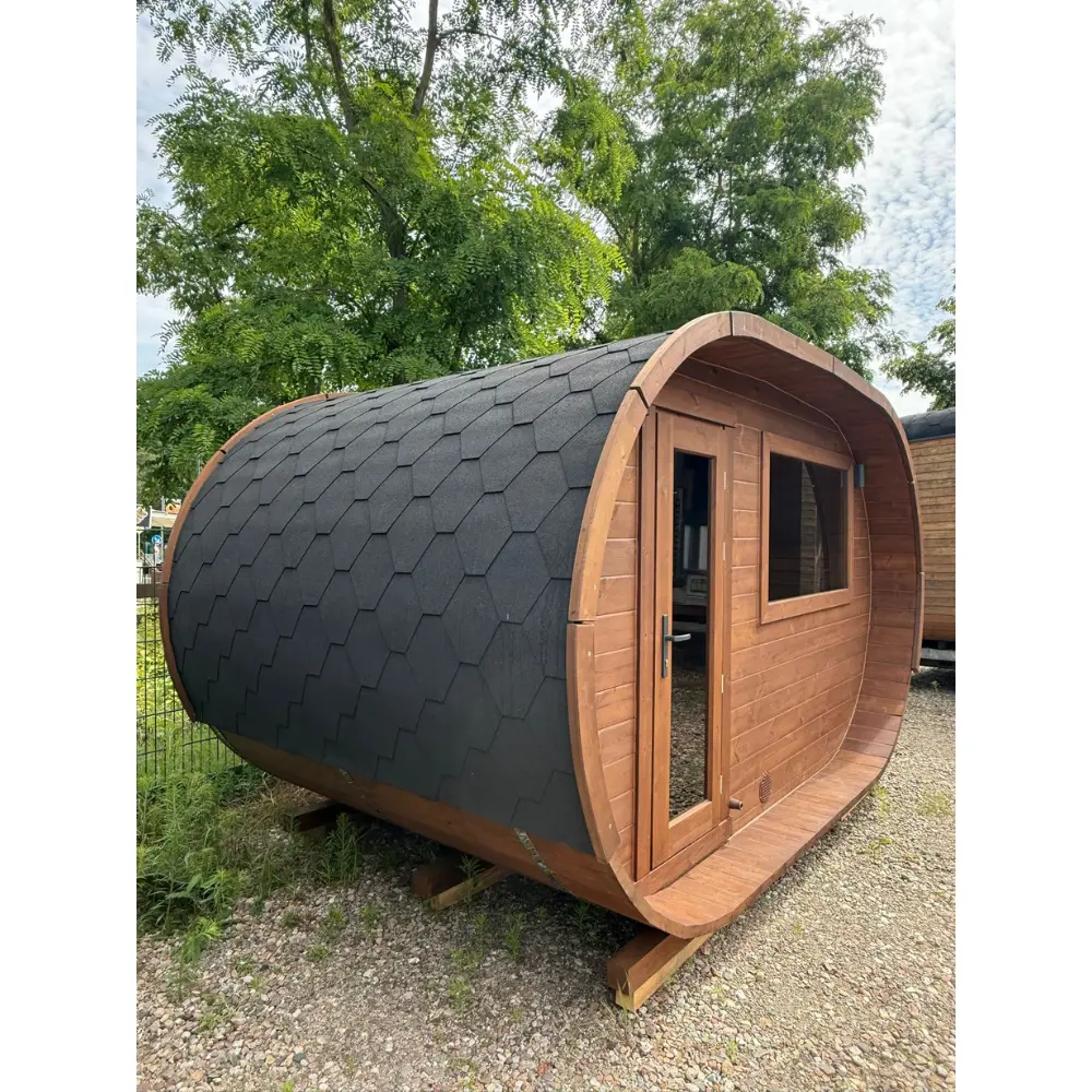 Thermoholz Sauna mit Ruheraum und Edelstahlbändern