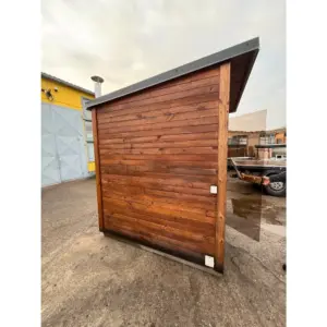 Thermoholz Gartensauna mit Holzofen sofort verfügbar seitlich